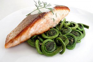 Crispy Pan-Seared Salmon with Sautéed Fiddlehead Ferns